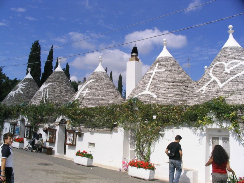 Alberobello: History Walking Tour - Rione Monti: trulli streets, real-world architecture, and local storytelling