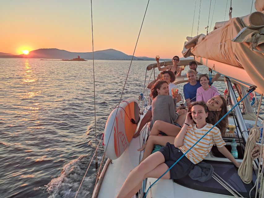 Alghero: Sunset Sailing Aperitif Experience - Aperitivo Afloat: Drinks, Snacks, Music, and Andrea’s Host Style