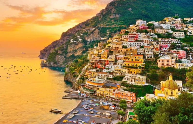 Amalfi: Sunset Boat Tour with Fruit and Drinks - Finding the Boat in Amalfi: The Piazza Flavio Gioia Pier Detail That Saves Time