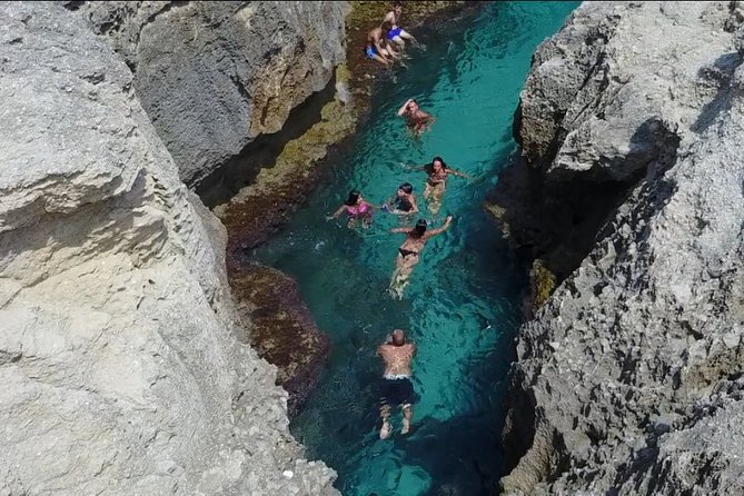 Amazing boat trip from Tropea to Capo Vaticano - 6 to 12 people - Praia di Fuoco: pirate waterfall, Roman port, and big snorkeling energy