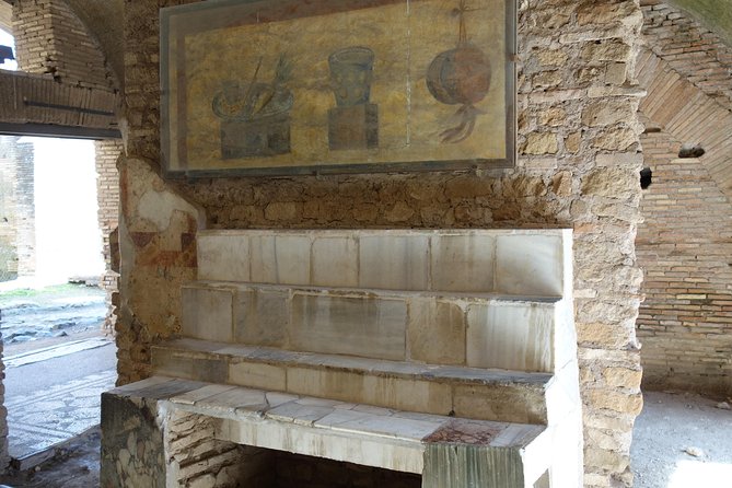 Ancient Ostia Antica Semi-Private Day Trip from Rome by Train with Guide - Following Decumanus Maximus, the Roman main street you can actually picture