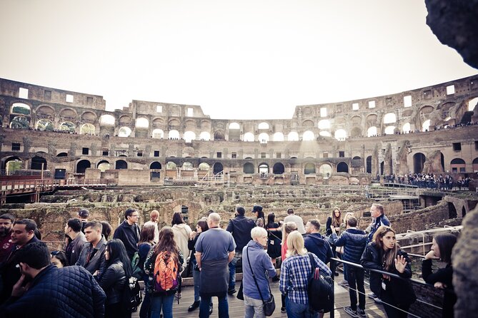 Ancient Rome Guided Walking Tour: Colosseum, Forum and Palatine - Entering the Colosseum: Reserved Tickets, Headsets, and Real Scale