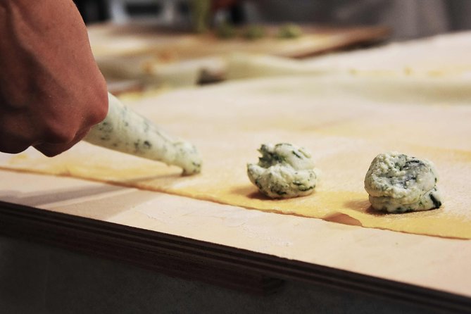 Become a Masterchef in Rome: Pasta, Ravioli and Tiramisù Class - The welcome spritz, chips, and bruschetta that set the mood