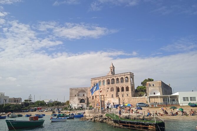Boat tour of the Polignano a Mare caves with aperitif - San Vito Abbey views: the calm opener before the caves