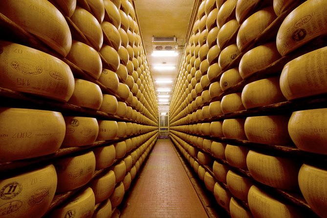 Bologna Food Experience: Factory tours & Family-Style Lunch - Balsamic vinegar barrel room in Castelvetro, plus breakfast of champions
