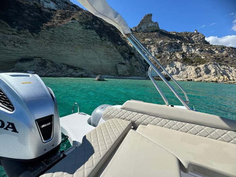 Cagliari: Boat Tour with 4 Swim Stops, Snorkeling & Prosecco - Sella del diavolo: the Devil’s Saddle stop you came for