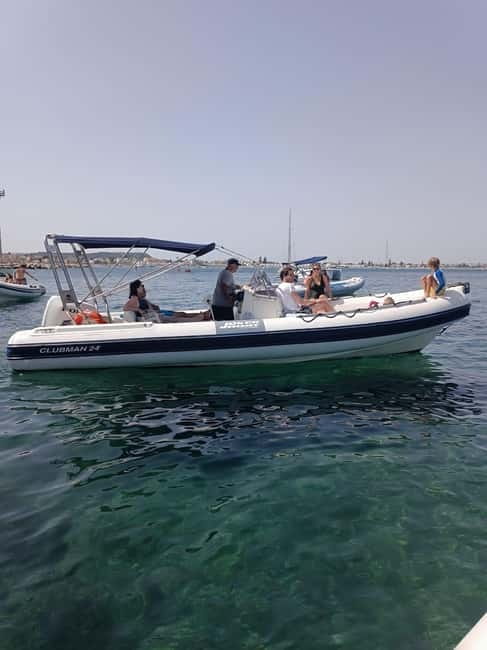 Cagliari: Devil's saddle boat tour, 4 stops and prosecco - Grotta dei Colombi: a short pass, a dramatic view, and sunset energy