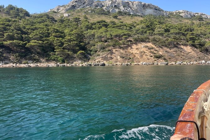 Cagliari Gulf Boat tour : 5 stops, snorkeling & local aperitif - Stop 5: Poetto, the long beach payoff, and the aperitivo moment