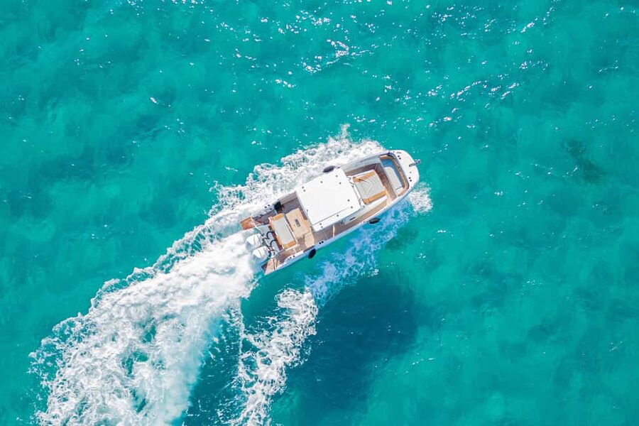 Cagliari: Luxury Motorboat Tour with 3 Swim Stops & Wine - Wine, Water, and On-Board Vibe: Local Touch Without the Pressure