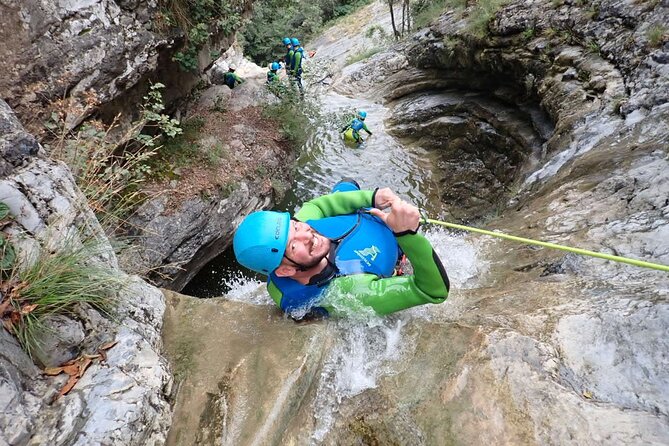 Canyoning "Vione" - advanced Canyoningtour also for sportive beginner - Gear that makes the canyon doable: wetsuit, harness, helmet, and safety kit