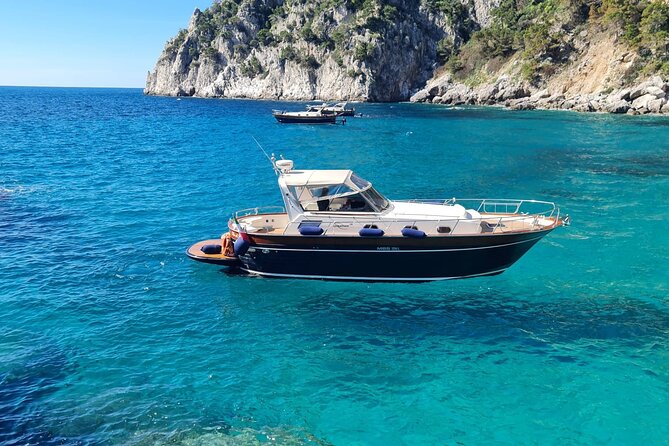 Capri Blue Grotto Small-Group Boat Day Tour From Sorrento - Marina Grande and the 1st-century BC villa view from the water