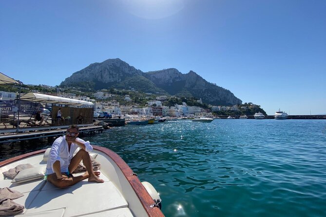 Capri Boat Tour: Grottoes, Swim & Sip Limoncello in a Small Group - Natural Arch, Curzio Malaparte, and the Sea-Forged Drama of Capri