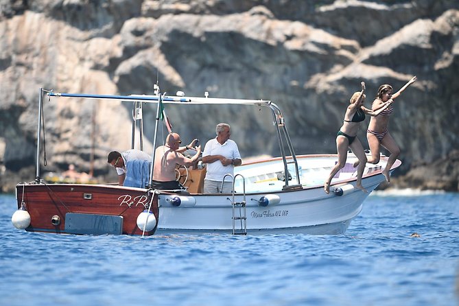 Capri Boat Tour: Grottoes, Swim & Sip Limoncello in a Small Group - Limoncello, Snacks, and the Real On-Board Experience