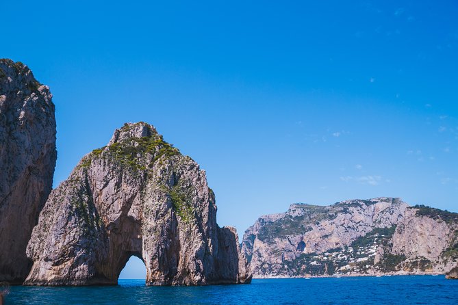 Capri Boat Tour: Grottoes, Swim & Sip Limoncello in a Small Group - Entering the Grotto Stops: Marvellous, White, and Green