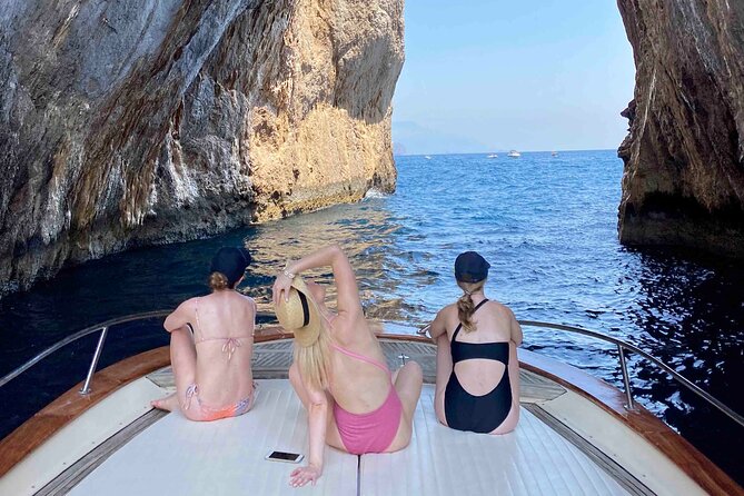 Capri Boat Tour with Optional Blue Grotto Visit from Sorrento - Anacapri coastline views and the lighthouse moment