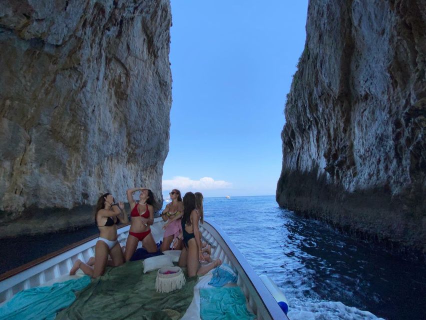 Capri: Island and Grottos Boat Cruise with Snacks and Drinks - Punta Carena Lighthouse and the Faraglioni Rocks Up Close