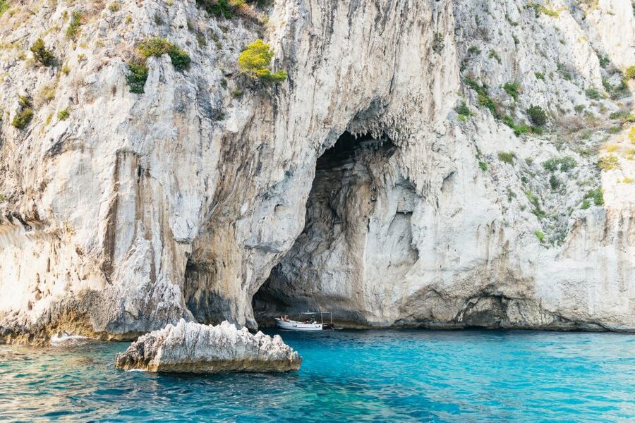 Capri: Island Boat Trip with Grottos - Passing Punta Carena and the Bagni di Tiberius area