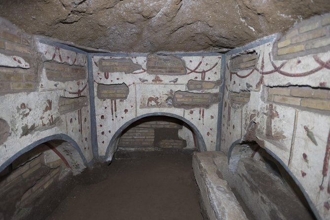 Catacombs Tour with Transfer – Optional Capuchin Crypt or Trevi - Trevi underground district option: English-guided below the fountain area