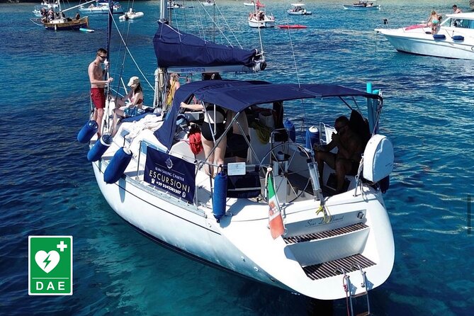 Catamaran tour stops bathing and snorkeling toast with prosecco - Cala Mosca area: stunning rock and why some spots stay view-only