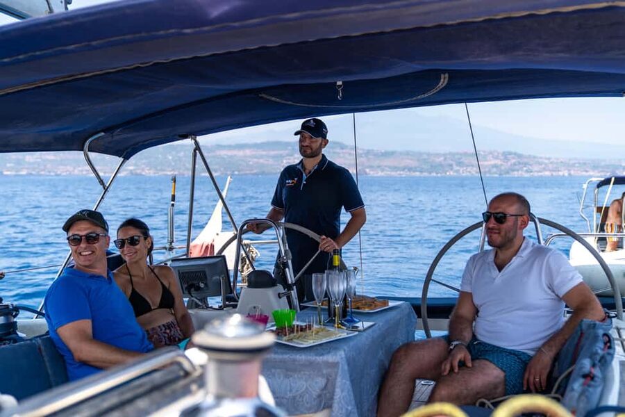 Catania: Cyclops Coast Cruise with Appetizer & Snorkeling - Lachea Island: swim, snorkel, and SUP time without rushing
