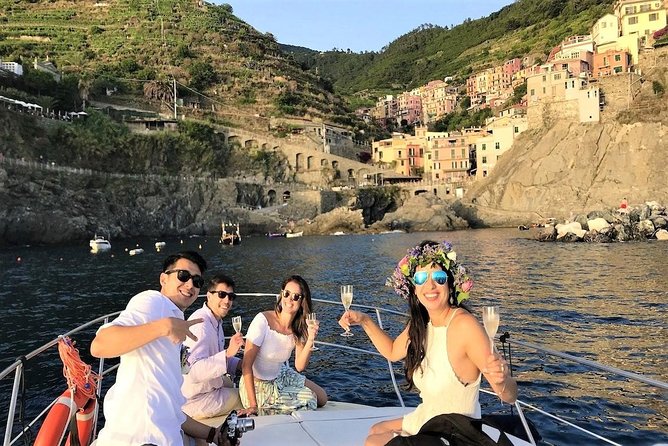 Cinque Terre Sunset Tour by Boat - Cinque Terre from the water: terraces, harbors, and the Blue Path in motion