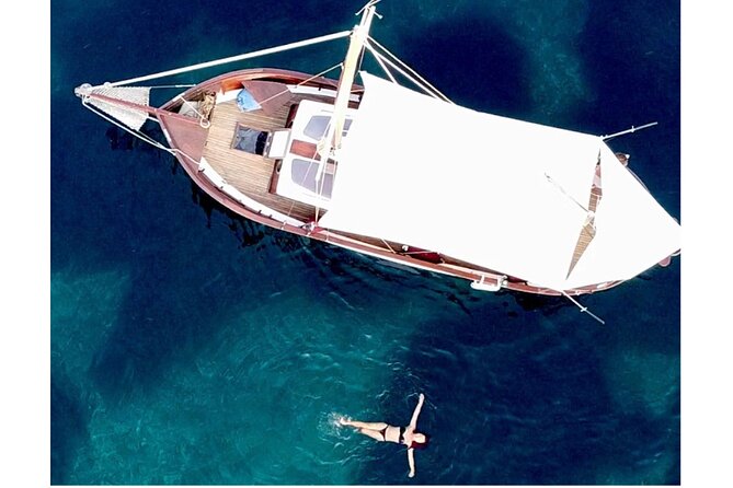 Classic Boat Tour in Palermo - Porto Arenella: Vella Igiea, a working tuna port, and a cave stop vibe