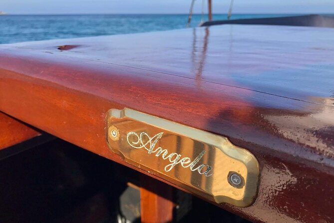 Classic Boat Tour in Palermo - Addaura Wave: caves above the jagged beach