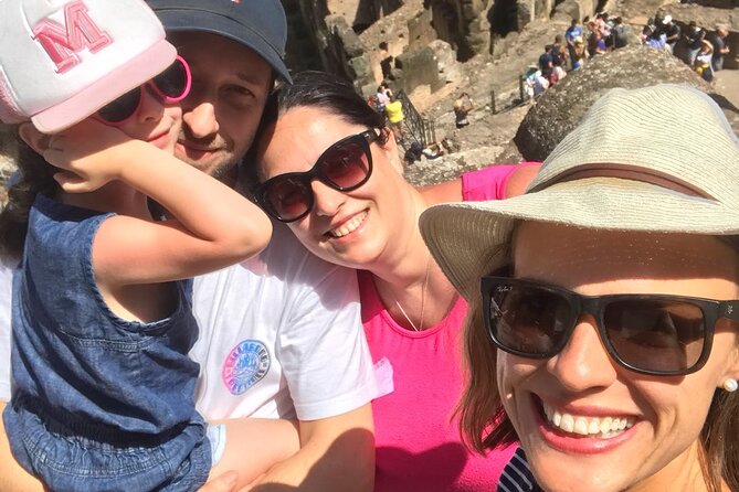 Colosseum & Ancient Rome for Kids Private Family Tour - Roman Forum: climbing ruins, finding Caesar links, and a Roman fountain moment