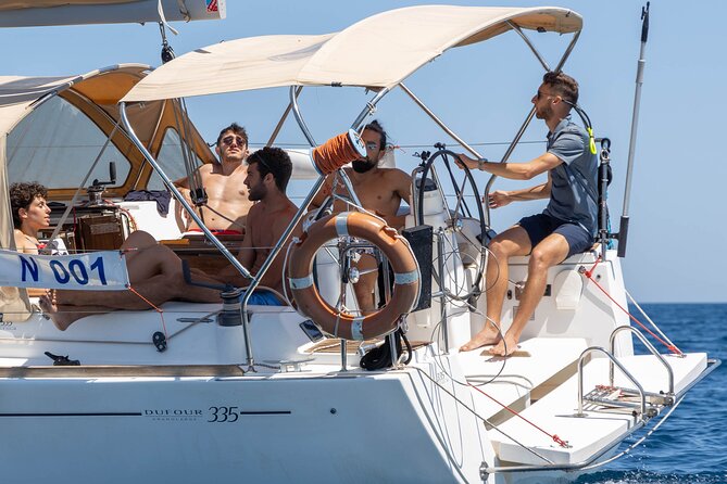 Egadi Sail Boat Tour to Favignana and Levanzo from Trapani - Favignana Port Time: A Walking Break Plus Lunch on Board