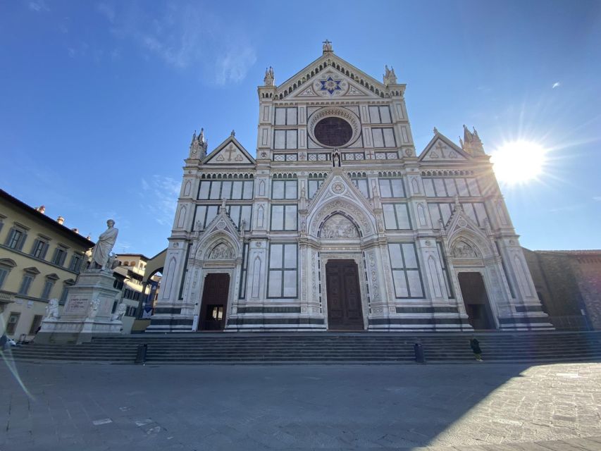 Florence: 1.5-hour Santa Croce Guided Experience - Getting there: Dante statue, purple flag, and zero tolerance for being late