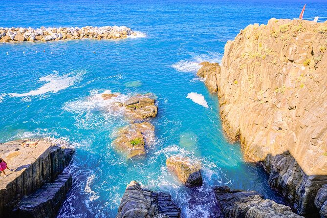 Florence: Cinque Terre Park Day Trip with Optional Street Food - Riomaggiore’s Golden Hour Energy and the 13th-Century Charm