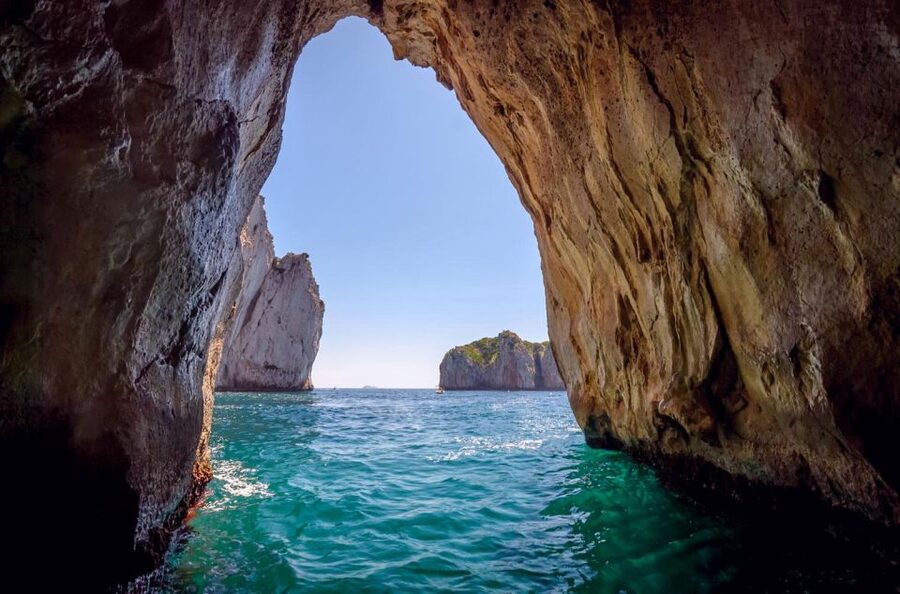 From Amalfi: Capri Island Boat Tour with Snorkeling & Drinks - Sophia Loren sightings, the Arch of Lovers, and grotto swim moments