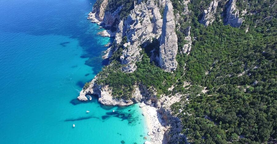 From Arbatax: Full-Day Guided Boat Tour of the Baunei Coast - Pools of Venus time 45 minutes, photos, and another swim chance