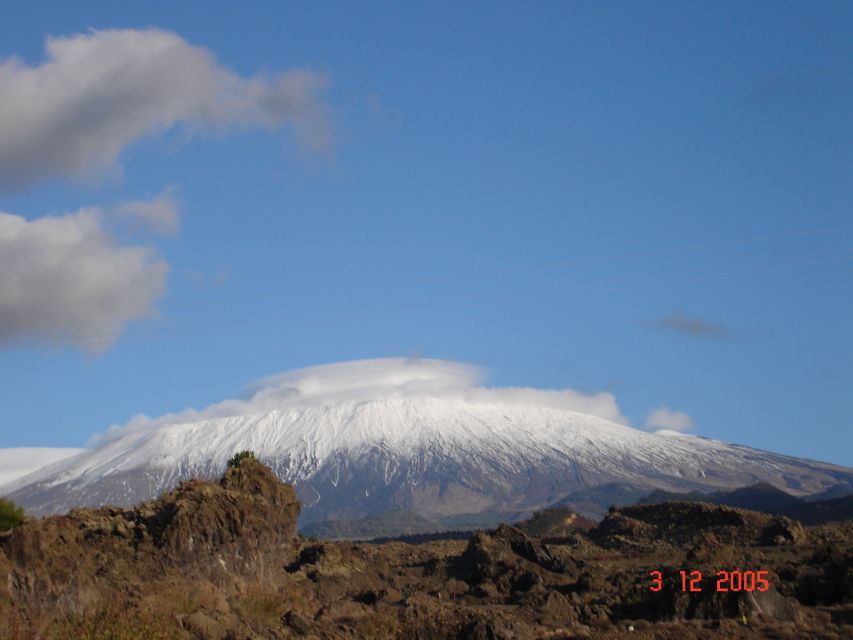 From Catania: Mount Etna Half-Day Tour and Wine Experience - Lava cave time with helmets and torches