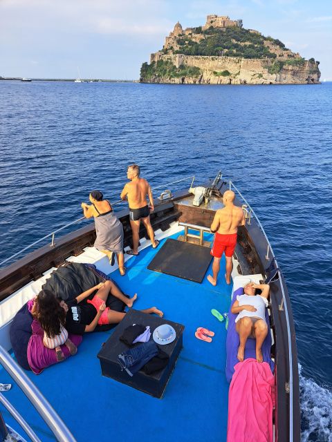 From Ischia: Procida Island Full-Day Boat Tour with Lunch - Hidden bays around Ischia: why the swim stops are the main event