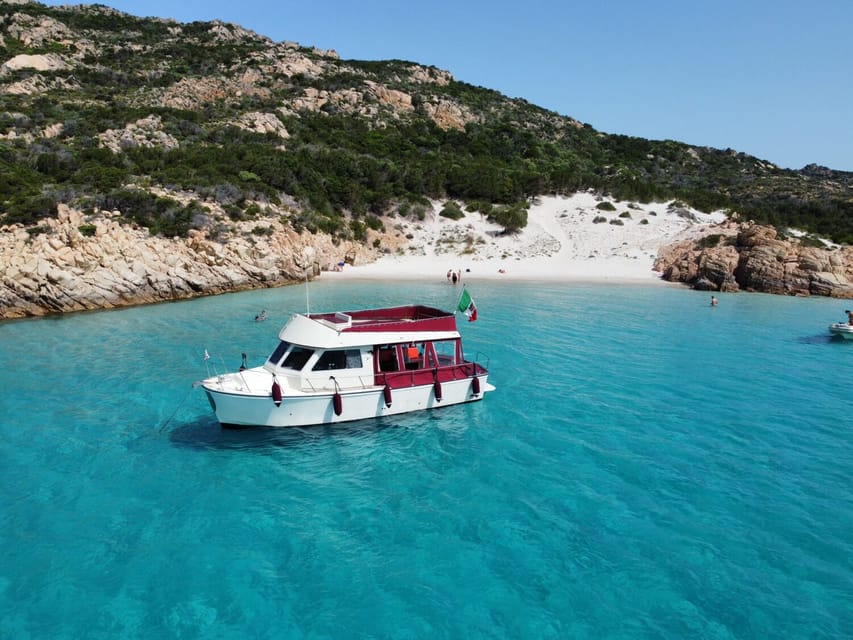 From Palau: La Maddalena Cruise with Lunch & Drinks - Stop 1: Cala Soraya and Cala Granara Swims in Quieter Water