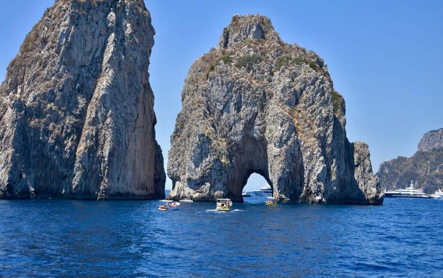 From Positano: Day trip to Capri - Group Tour by boat - Capri’s shoreline on the approach: Marina Grande, then the famous rocks