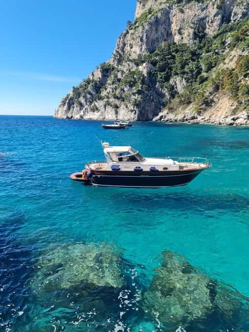 From Sorrento: Capri Boat Tour with Blue Grotto Visit - Drinks, champagne tasting, and the return to Sorrento