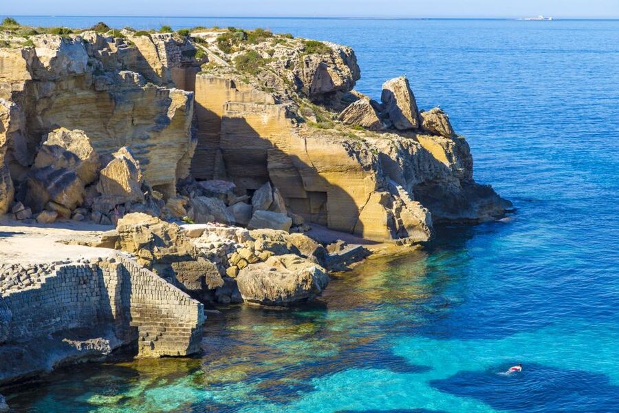 From Trapani: Cruise to Favignana and Levanzo with lunch - Cruising Favignana’s creeks: Cala Rossa, Bue Marino, Cala Azzurra