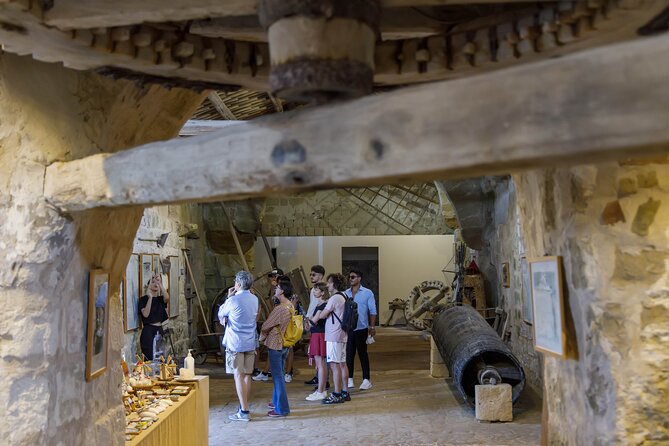Guided tour of the salt pans of Trapani and the Salt Museum - Entering Riserva Naturale Saline di Trapani e Paceco on the salt-tank perimeter