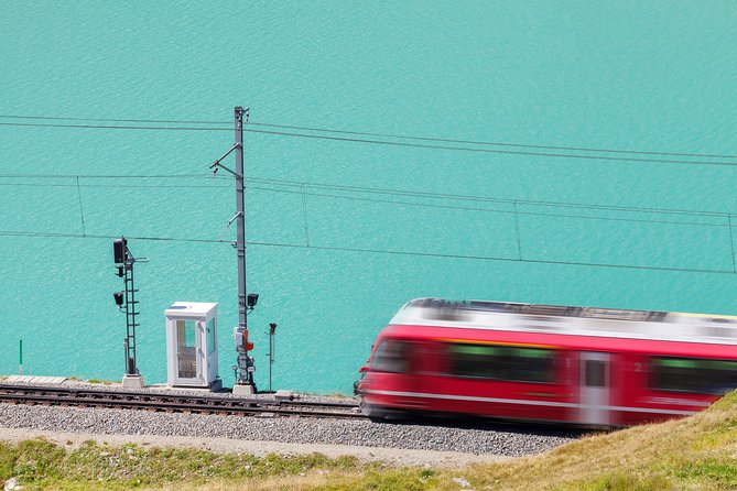 Intimate Small-Group Bernina UNESCO Scenic Train on Swiss Alps - Tirano and the Bernina station connection, where your timing tightens