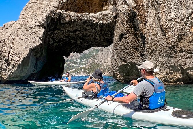Kayak tour in Capri between caves and beaches. Photos included. - Arco della Stella and the Faraglioni GoPro photo moment