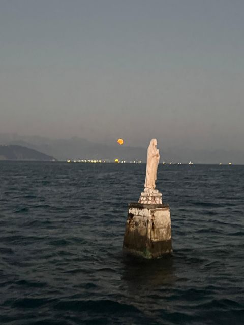 La Spezia: Sunset Boat Tour with Aperitivo and Snacks - Tino Island and the lighthouse you can see still in use
