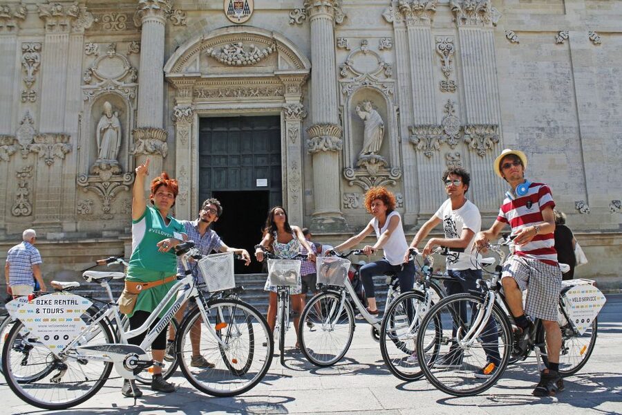 Lecce: City Highlights Guided Tour by Bike - Porta Napoli: Lecce’s monumental entrance and city “logic”