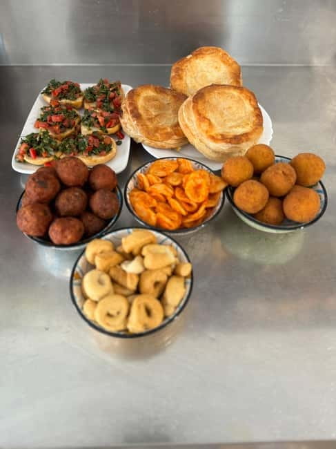 Lecce: Guided Street Food Walking Tour with Food and Wine - Winding alleys to Porta San Biggio: the tour turns into a real stroll