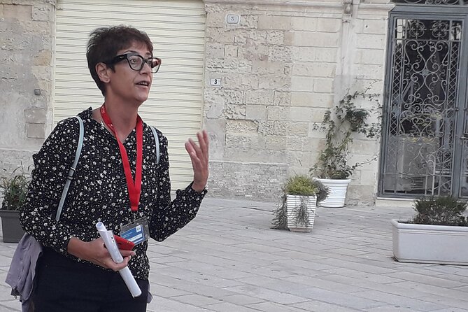 Lecce History and Street Food Tasting Small Group Tour - Anfiteatro Romano, Lecce’s smaller “colosseo” moment