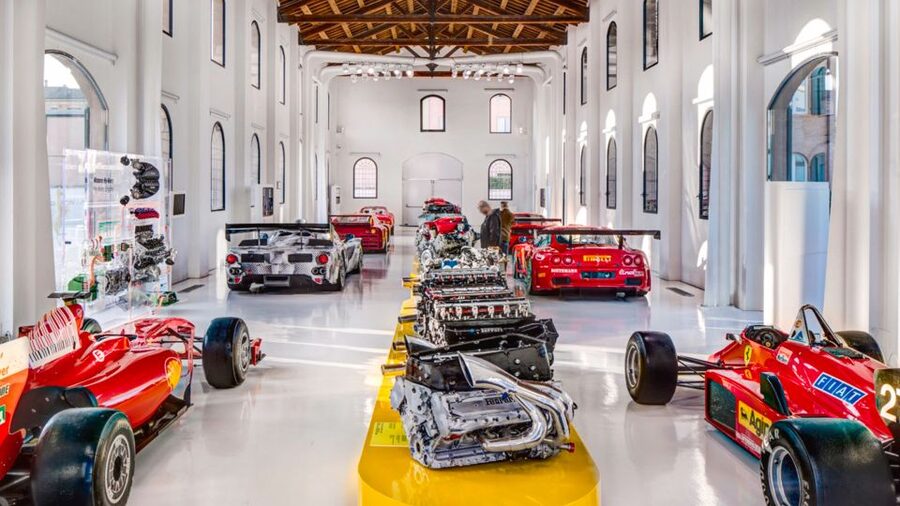 Maranello and Modena: Ferrari Museums Combo Tickets - Modena Ferrari Museum: the yellow-hood building and Enzo’s story in motion