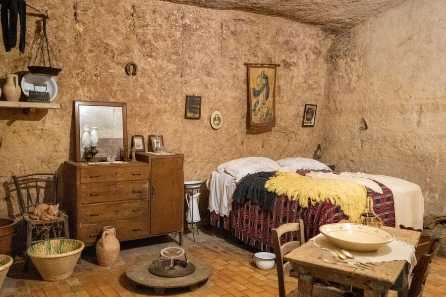 Matera: Sassi Tour with Cave House and Rupestrian Church - Inside a rupestrian church: why SantAntonio Abate matters