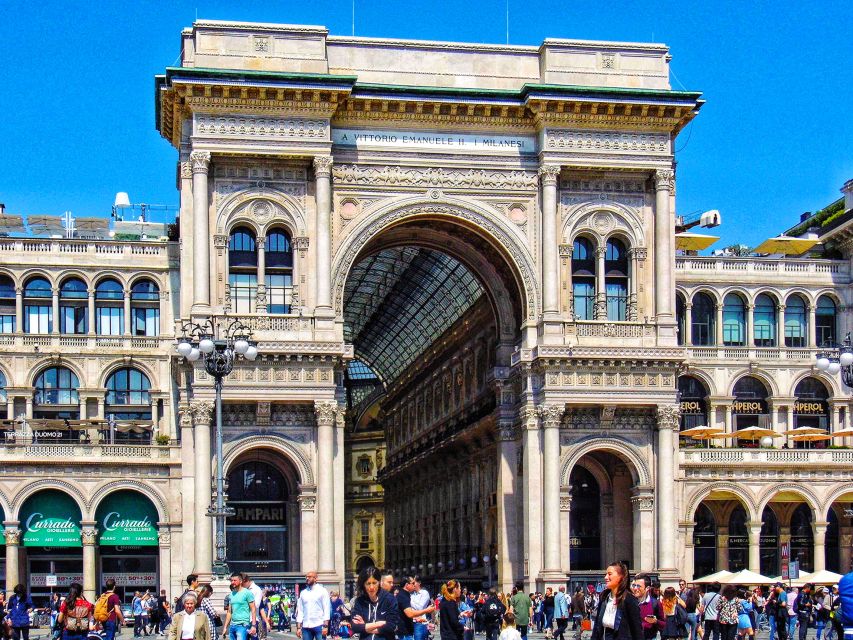 Milan: Skip-the-Line Guided Walk and "The Last Supper" - Sforza Castle area views, a powerful contrast to the fashion vibe