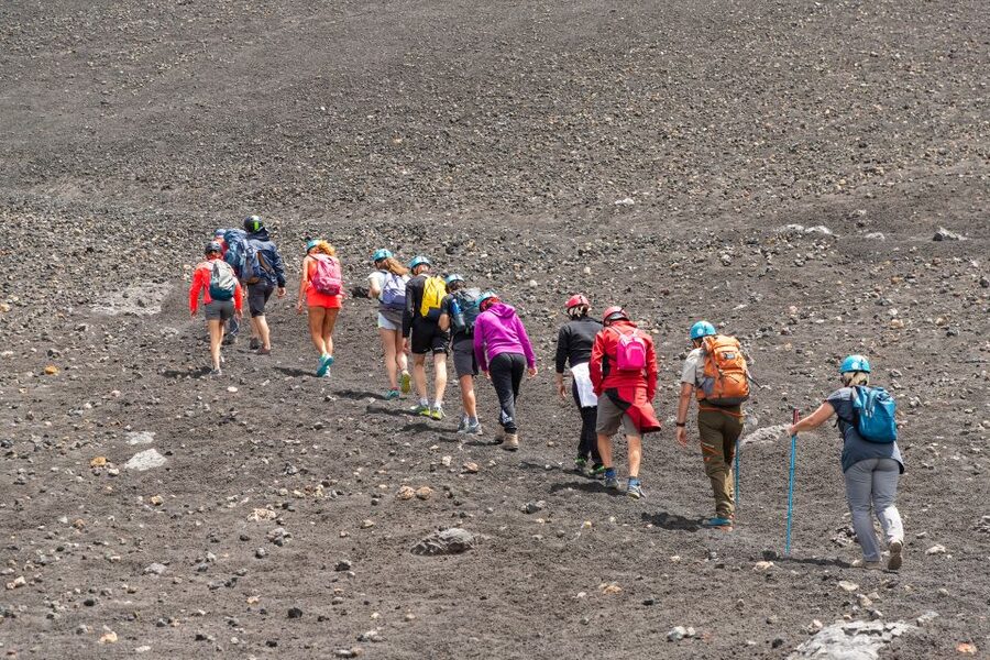 Mount Etna: Guided Volcano Summit Hiking Tour with Cable Car - The summit crater hike: volcanic terrain, long breaks, and a moving target